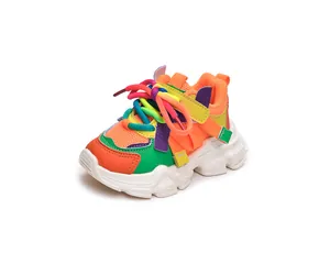 Detail of colorful children sneakers with breathable mesh and chunky non-slip rubber sole