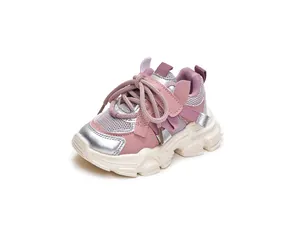Detail of pink and silver mesh girl's chunky sneaker with durable non-slip rubber sole