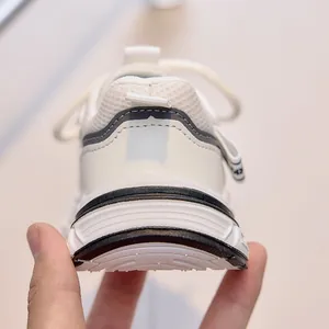 Detailed view of children's breathable mesh sneakers with thick anti-slip sole