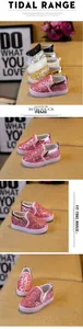 Detailed view of kids glitter slip-on shoes with LED soles and metallic leather trim