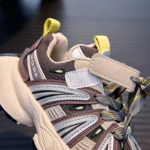 Detail view of breathable kids' sneakers with Velcro straps and thick anti-slip soles
