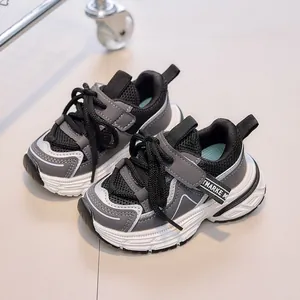 Detail view of children's breathable mesh sneakers with chunky anti-slip sole and Velcro strap