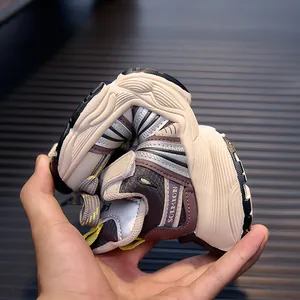 Close-up showing the flexible non-slip sole of the children's breathable sneaker