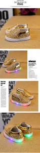 Detail of gold sequin toddler shoes showing the integrated multi-color LED glowing soles