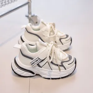 Top-view of breathable kids sneakers featuring beige mesh, faux leather and velcro straps