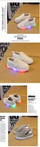 Detailed view of LED light-up soles and silver glitter upper on kids slip-on sneakers