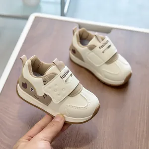 Cartoon elephant toddler sneakers in beige with non-slip rubber soles and velcro closure