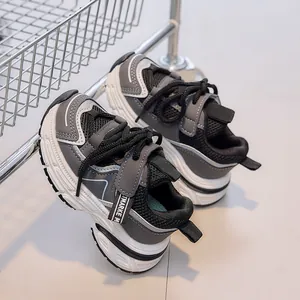 Kids breathable mesh sneakers with chunky sole in grey and black patchwork design