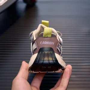 Detail view of children sports sneaker heel with fashion text and non-slip sole