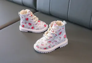 Detail view of toddler boots with strawberry print, soft fleece lining and side zipper