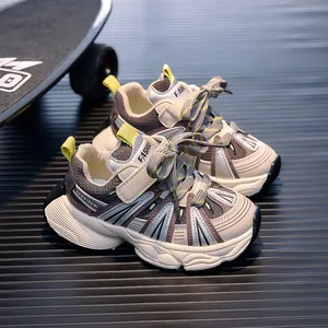 Kids breathable mesh sneakers with beige and green contrast colors and thick non-slip soles