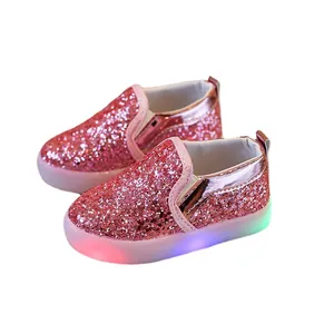 Pink glitter LED shoes for kids featuring sparkling sequins and colorful light-up soles