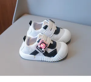 Detail of baby soft-sole walking shoes with cartoon bear LED lights and rubber toe protection