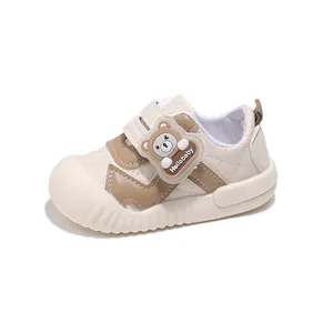 Cute cartoon bear baby walking shoes in beige with velcro straps and soft soles