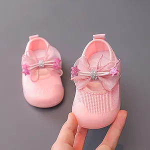 Pink breathable mesh toddler shoes with soft soles and decorative bow for girls