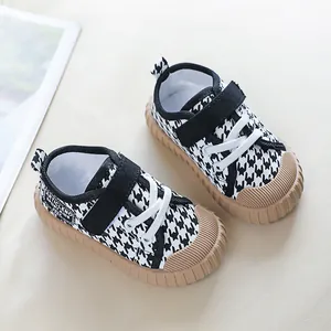 Toddler low-top canvas shoes with houndstooth pattern and brown rubber anti-slip soles