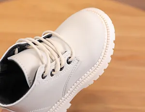 Close-up of off-white kids martin boots featuring premium leather and durable anti-slip sole