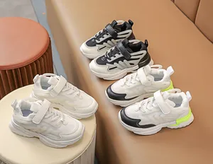 Detail view of children luminous sneakers with mesh uppers and secure velcro straps