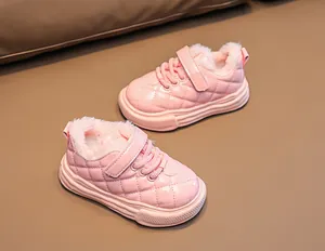 Detailed view of pink toddler winter boots with warm faux fur lining and anti-slip sole