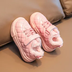 Pink winter warm children's shoes with glossy leather, quilted texture and fleece lining