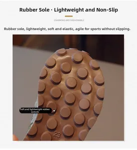 Macro view of brown rubber outsole with non-slip round grip pattern and size 23 mark