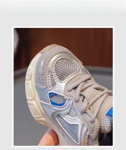 Macro detail of breathable mesh and soft leather upper on kids sports running shoes