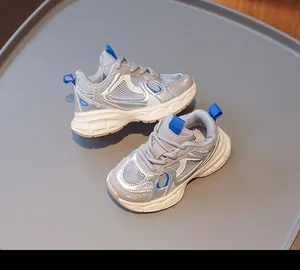 Detailed view of breathable mesh and synthetic leather layers on kids' sneakers
