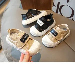 Detail view of toddler sneakers with velcro straps and thick anti-slip rubber soles