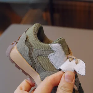 Kids olive green and khaki suede sneakers with breathable mesh and velcro closure