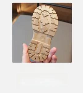 Detail view of the durable non-slip rubber sole with size 23 marking for baby boots