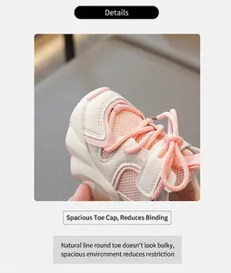 Detailed close-up of pink and white mesh material on breathable kids sports shoes