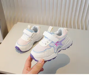 Detailed side view of breathable mesh toddler sneakers with a gradient star design