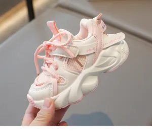 Detailed side view of breathable mesh toddler sneakers with chunky cushioned soles