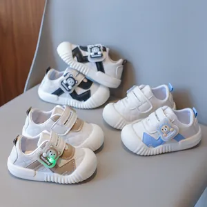 Cute LED light-up toddler walking shoes with cartoon bear and quilted design