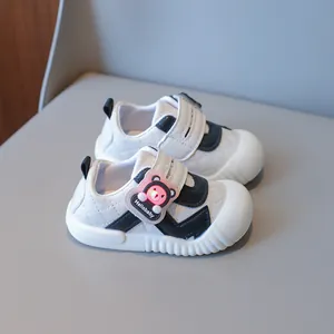 Toddler walking shoes with glowing cartoon bear and anti-slip rubber soles in white