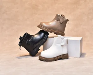 Three colors of children's leather boots featuring a side zipper and thick non-slip soles