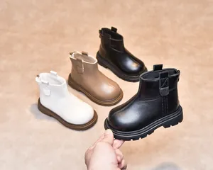 Detailed comparison of children's Chelsea boots in black, white and khaki colors