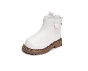 Detail view of white leather kids boot with chunky brown sole and side stitching