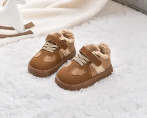Close-up of kids warm winter boots with soft faux shearling lining and velcro strap