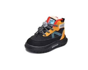 Detail of children winter snow boot with thick red faux fur lining and bungee laces