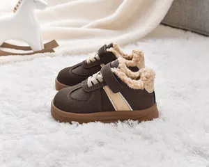 Detail of warm lamb wool lining and slip-resistant sole on kids winter boots