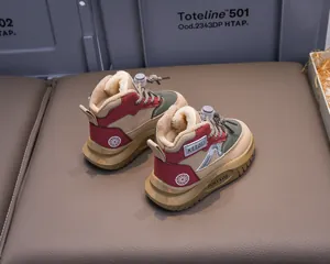 Detailed view of warm plush lining and toggle laces on children winter boots