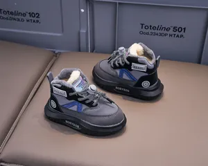 Detail view of children's winter boots with warm fleece lining and bungee cord laces