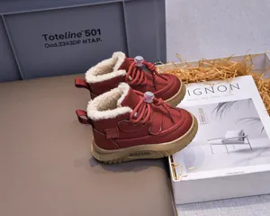 Detailed view of warm winter baby boots with thick plush lining and anti-slip rubber soles
