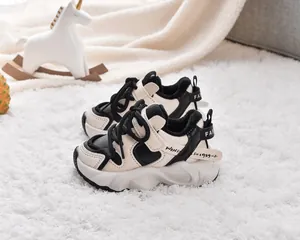 Close-up of winter baby sneakers featuring warm plush lining and velcro closure