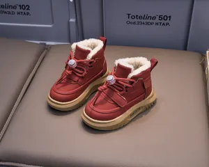 Close-up of kids winter boots with warm plush lining and durable thick rubber soles