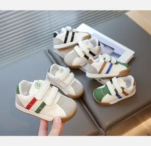 Detail of kids vintage sport shoes featuring double velcro straps and non-slip rubber soles