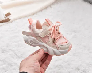 Detail of warm pink toddler winter sneakers with plush lining and velcro strap
