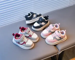 Close-up of three colorways of kids sneakers featuring quilted texture and 1987 tongue detail