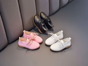 Detailed collection of kids' lace-up leather shoes in black, pink, and white options